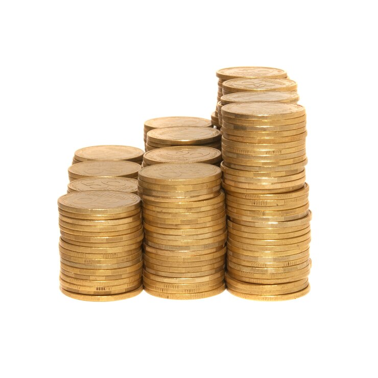 Stack of golden coins isolated