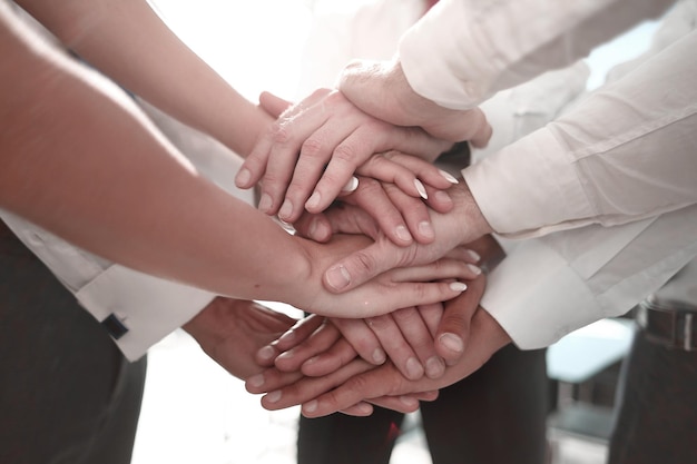 Stack of hands real people agreement