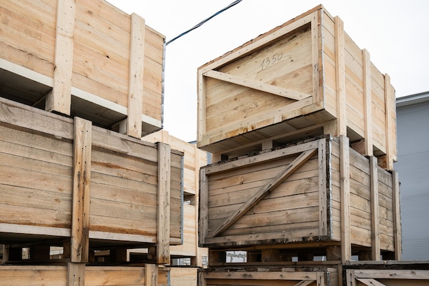 A stack of huge wooden crates in a storage area