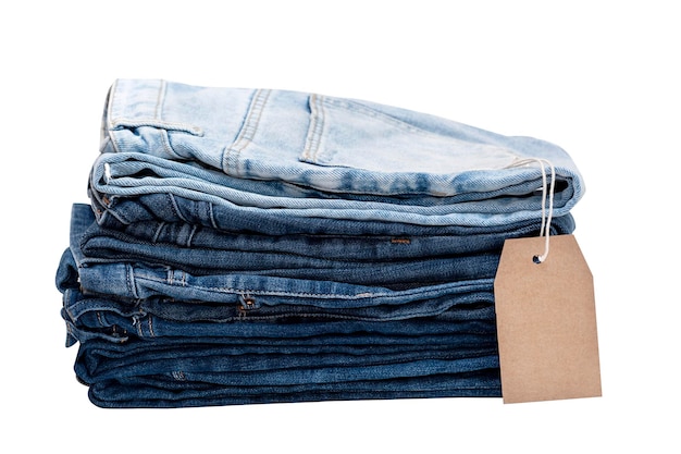 Stack of jeans with label isolated on white background