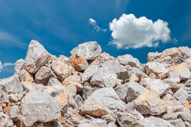 Stack of Limesotne with blue sky, Stone material for building construction
