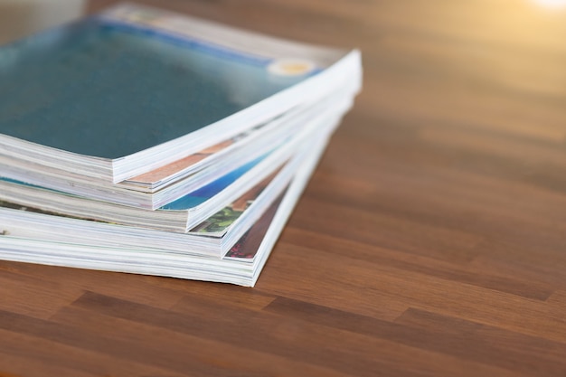 stack of magazines on table living room