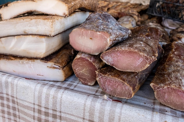 A stack of meats on a table