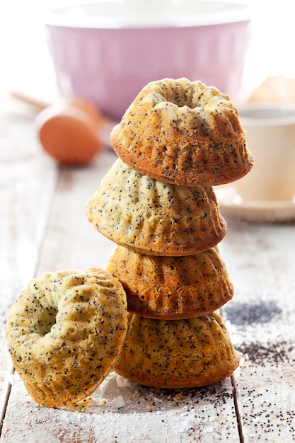 Stack of mini muffins with poppy seed