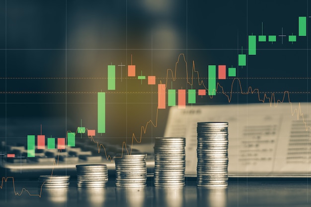 Stack of money coin with trading graph, financial investment background