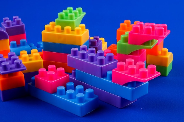 Photo stack of multi colored toys on table