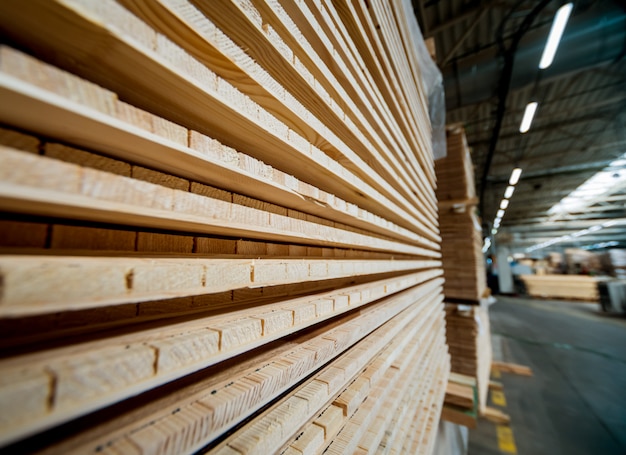 Stack of natural rough wooden boards.