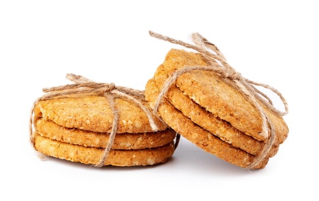 Stack of oat cookies isolated on white background