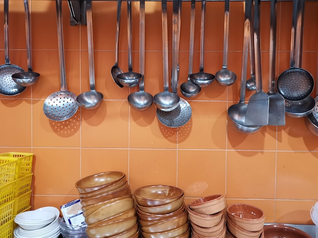 Photo stack of objects on floor against wall