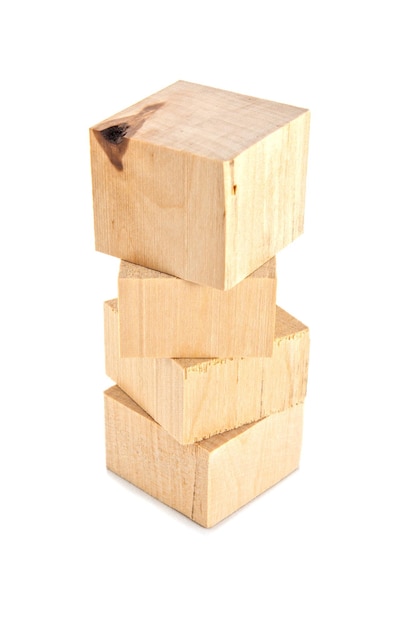 Stack off four wooden cubes isolated on white background