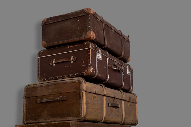 A stack of old baggage suitcases packed before start of the trip