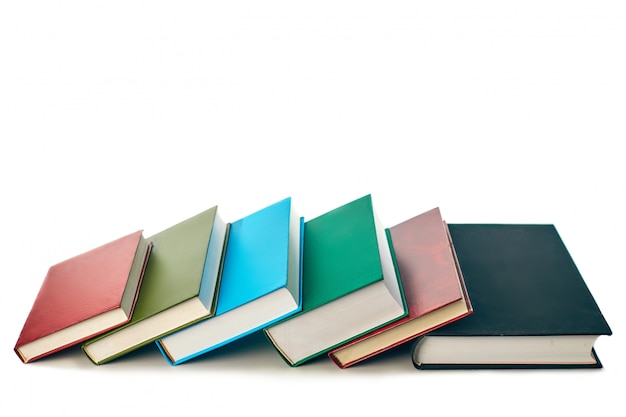 Stack of old books isolated on white background