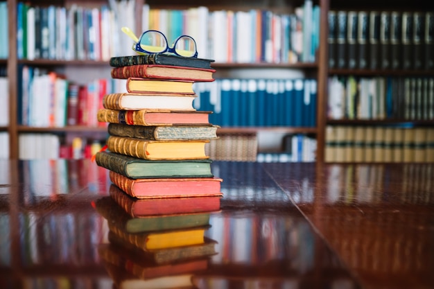 Stack of old books in library