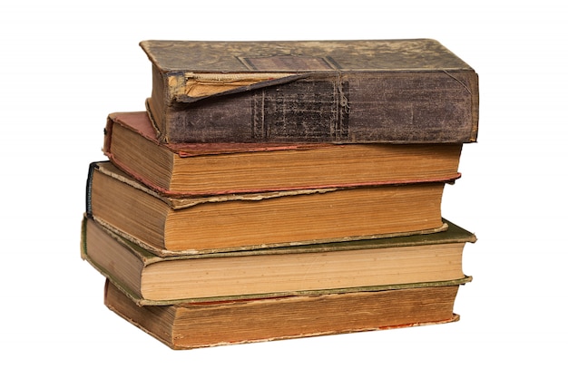 Stack of old books on white 