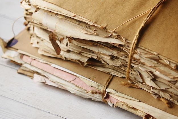 Stack of old papers on table