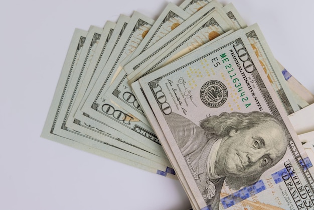 Stack of one hundred us dollar paper currency bills closeup