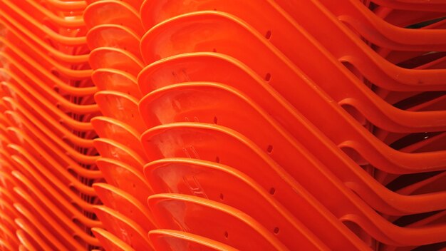 Stack of orange chairs