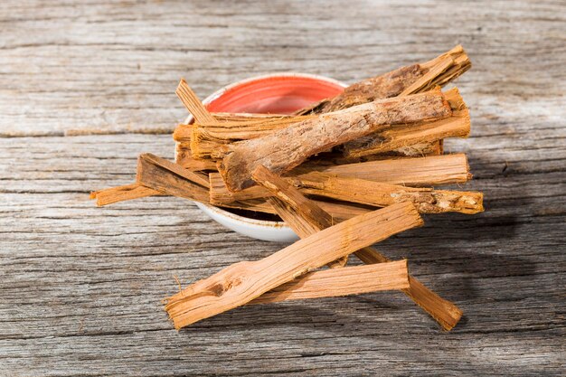 Stack of palo santo wood on the table Bursera graveolens