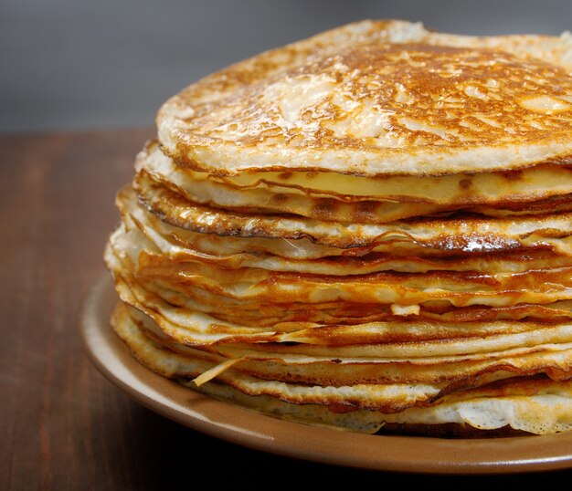 Stack of pancakes on plate russian traditional food