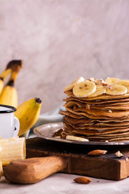 Stack of pancakes with ingredients