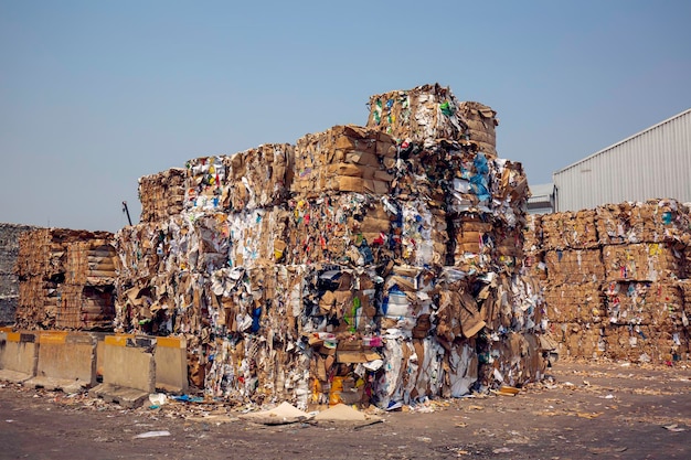 Stack of paper waste before shredding at recycling