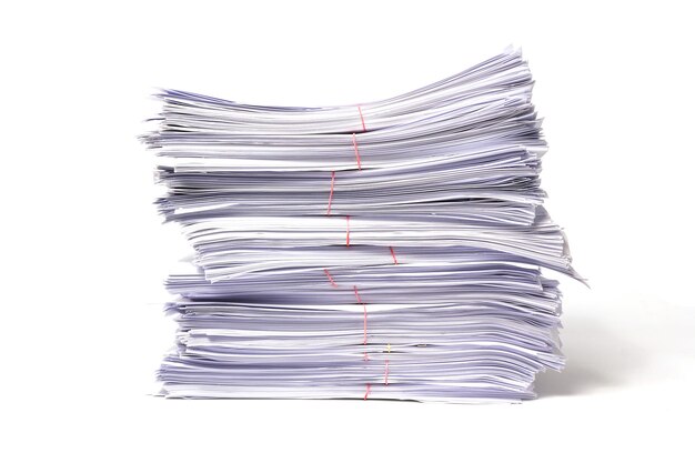Stack of papers against white background