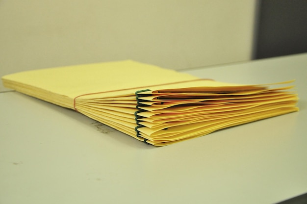 Photo stack of papers on table