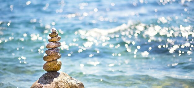 Photo stack of pebbles on beach