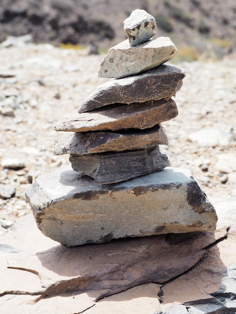 Photo stack of pebbles on sand at beach