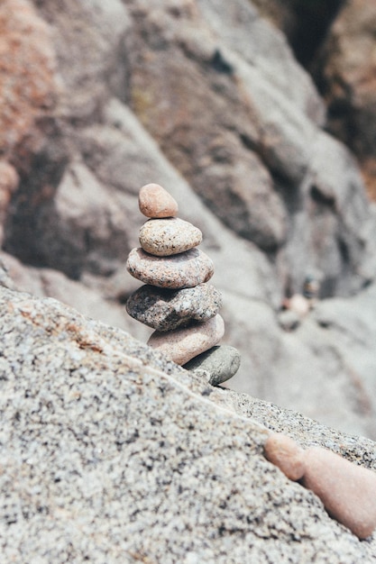 Photo stack of pebbles on sand at beach