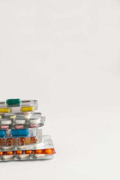 Stack of pills on a white background