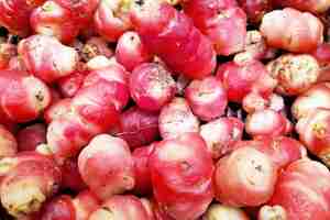 Photo stack of pink oca on a market stall