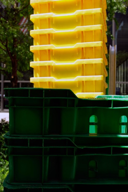 Photo stack of plastic crates at market stall