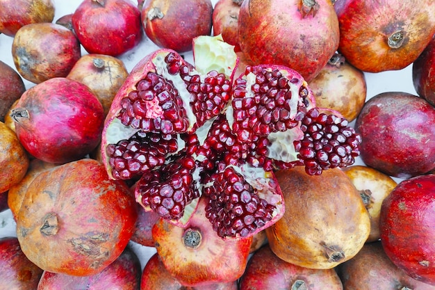 Stack of pomegranates a market stall