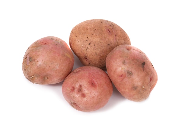 Stack of potatoes isolated on white background