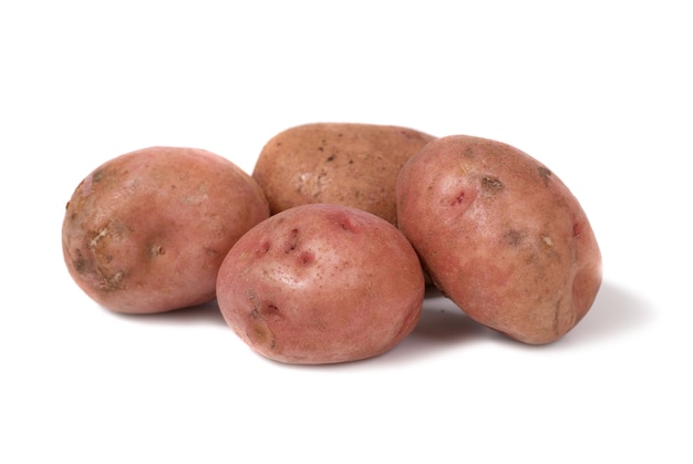 Stack of potatoes isolated on white background