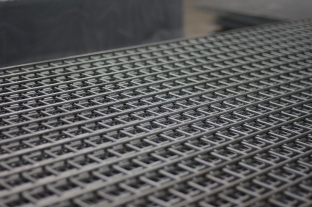 Stack of profile style welded mesh fencing panels uncoated manufactured in the factory