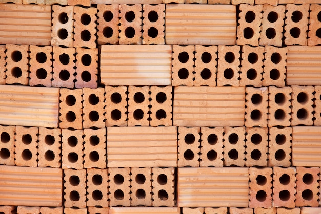 Foto pila di blocchi di mattoni rossi per la costruzione