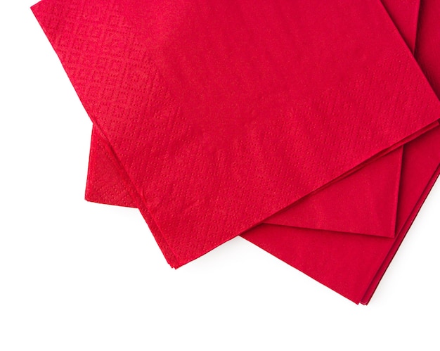 Photo stack of red paper napkins isolated on white background