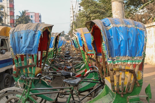 Photo stack of rickshaws a kind of vehicle