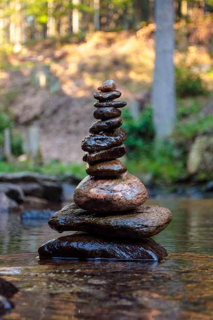 A stack of rocks with the word zen on it