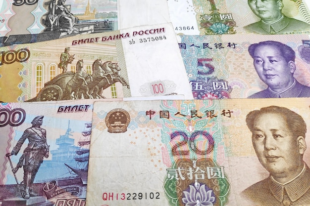 Photo stack of russian rubles and chinese renminbi