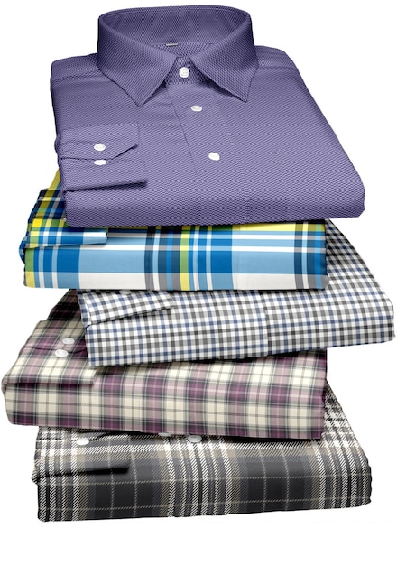 A stack of shirts with a blue shirt on top