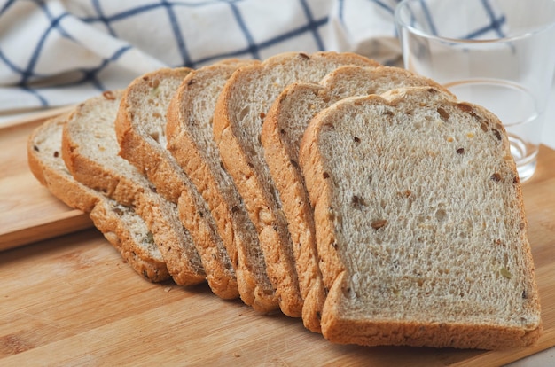 A stack of sliced bread on a cutting board