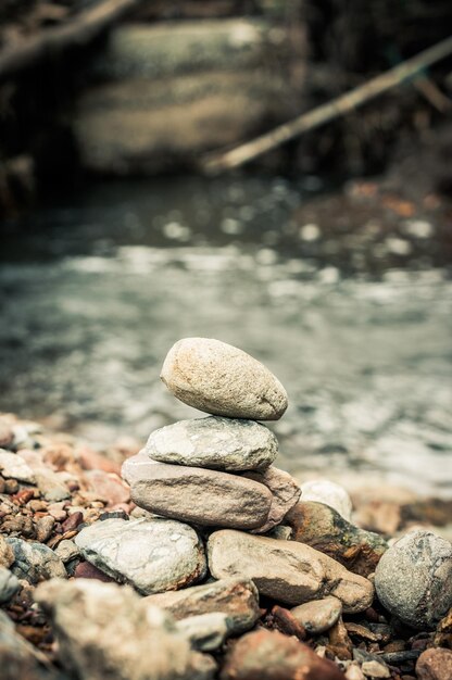 Photo stack of stones against river