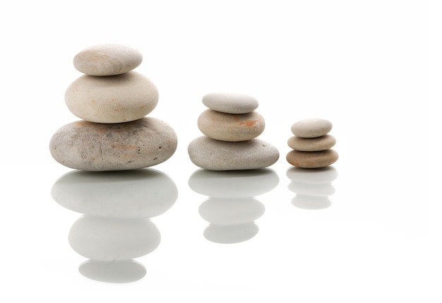 Photo stack of stones against white background