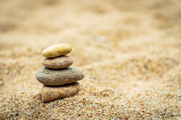 Stack of stones on sand