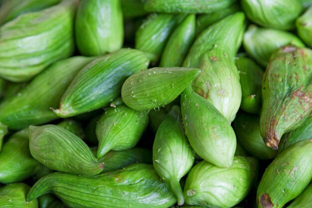 Stack of Stuffing cucumbers on a market stall