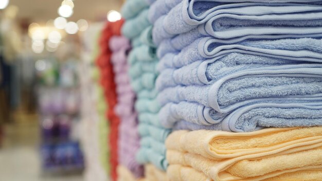 Stack of towels with blur background displayed at shopping mall