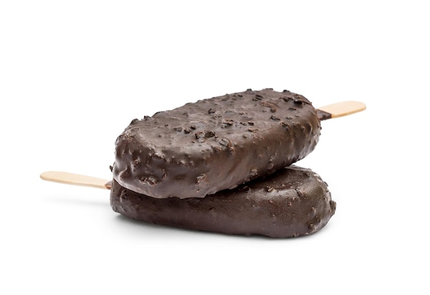Stack of two chocolate ice creams on a stick on white background